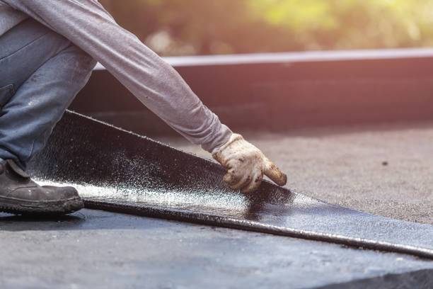Professional Exterior Waterproofing technician working in East Northport, NY